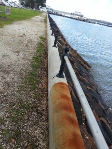 Buttress walls showing the cleaned rust area.